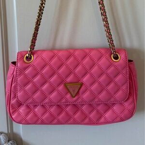 Pink Guess Giully convertible crossbody flap bag.